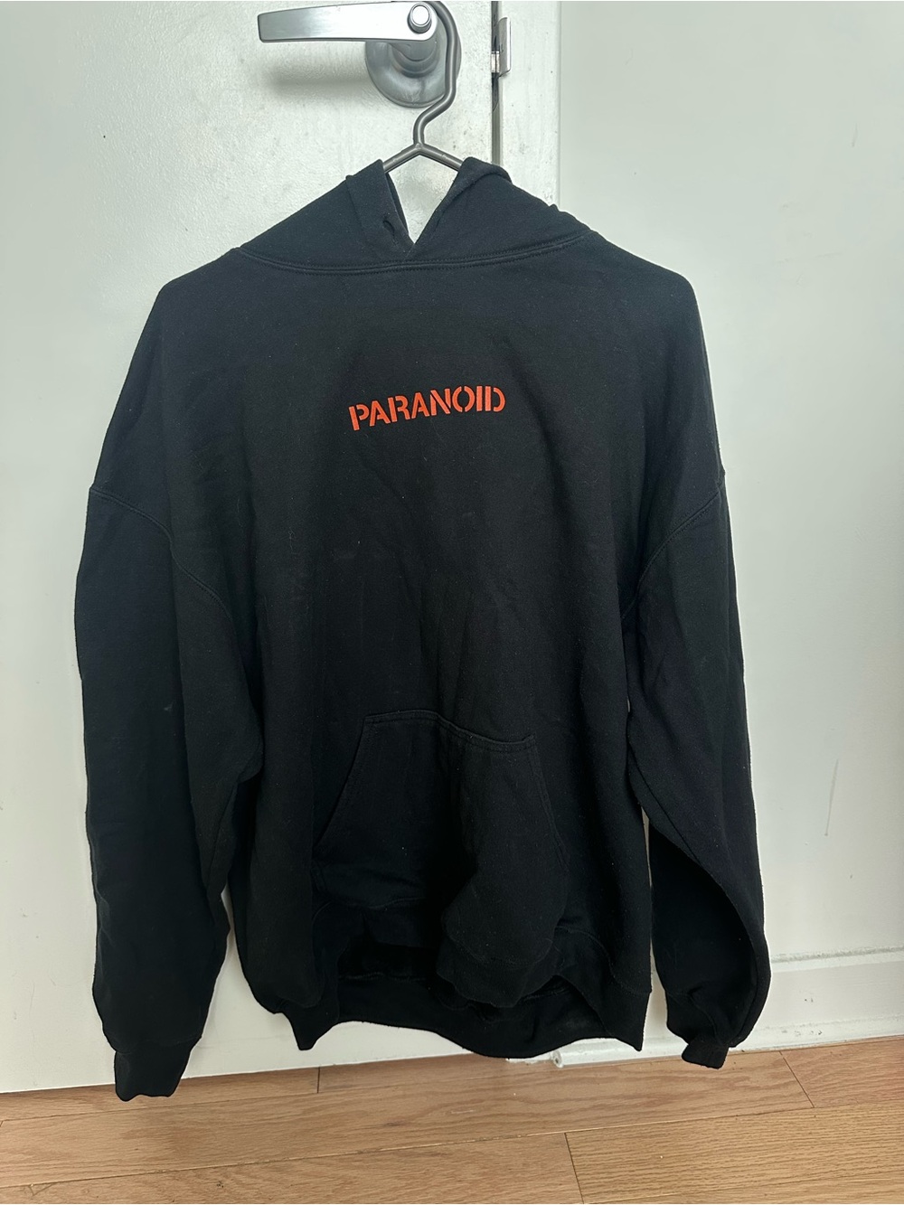 Anti Social Social Club Black Hoodie with Orange "PARANOID" Graphic